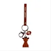 the geometric aspect creative cartoon lovely a brown dog resin coating a key chain