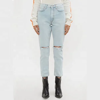 jeans with rips in front and back