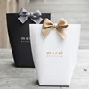 WLT2-242 Classic white black small size gift packaging fashion products cosmetic paper bag with custom gold foil logo printing