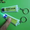 Hot sell premium gifts high quality tube shape pvc squeeze keyring with flashlight