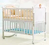 Welcomed multifunctional solid pine wood baby cot bed, portable painted baby cradle