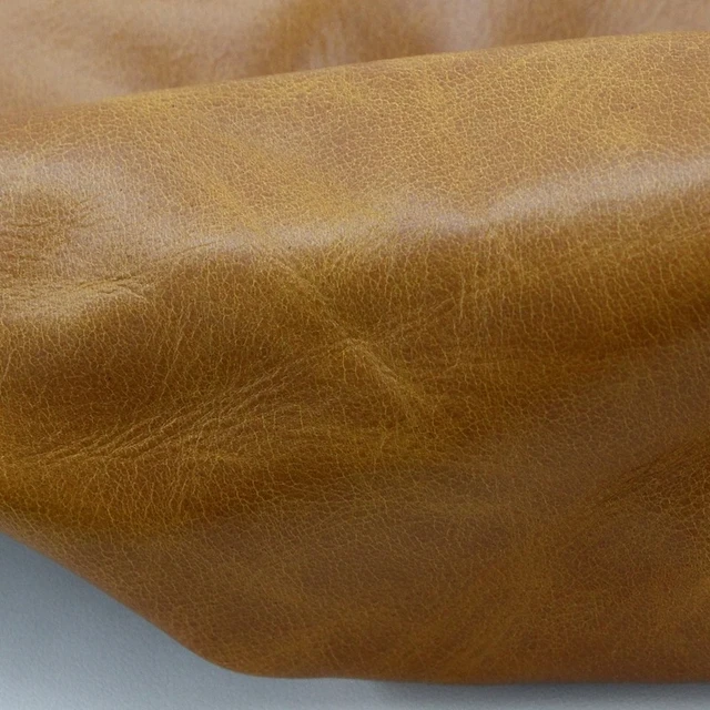 tan and white adult cow leather thickness aniline pig