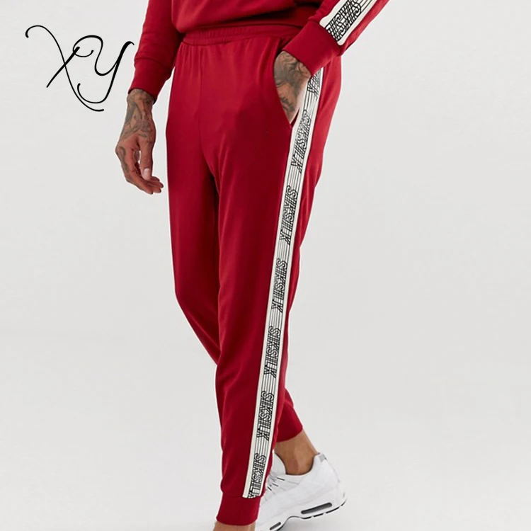 red jogging suit