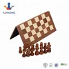 Wooden fold chess board with chess pieces