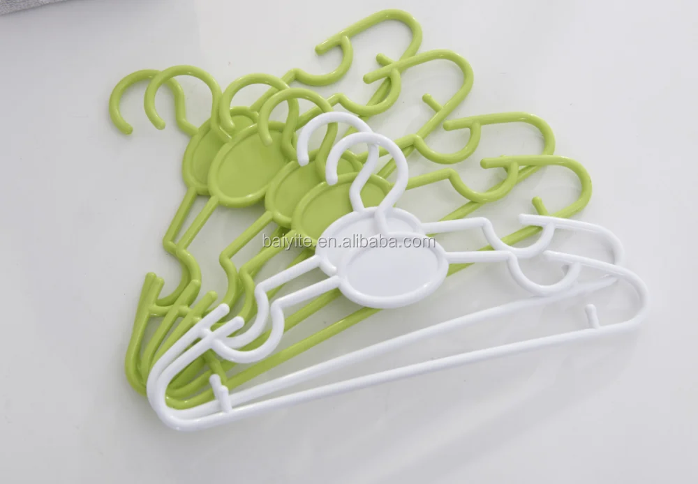 green and white clothes hanger.png