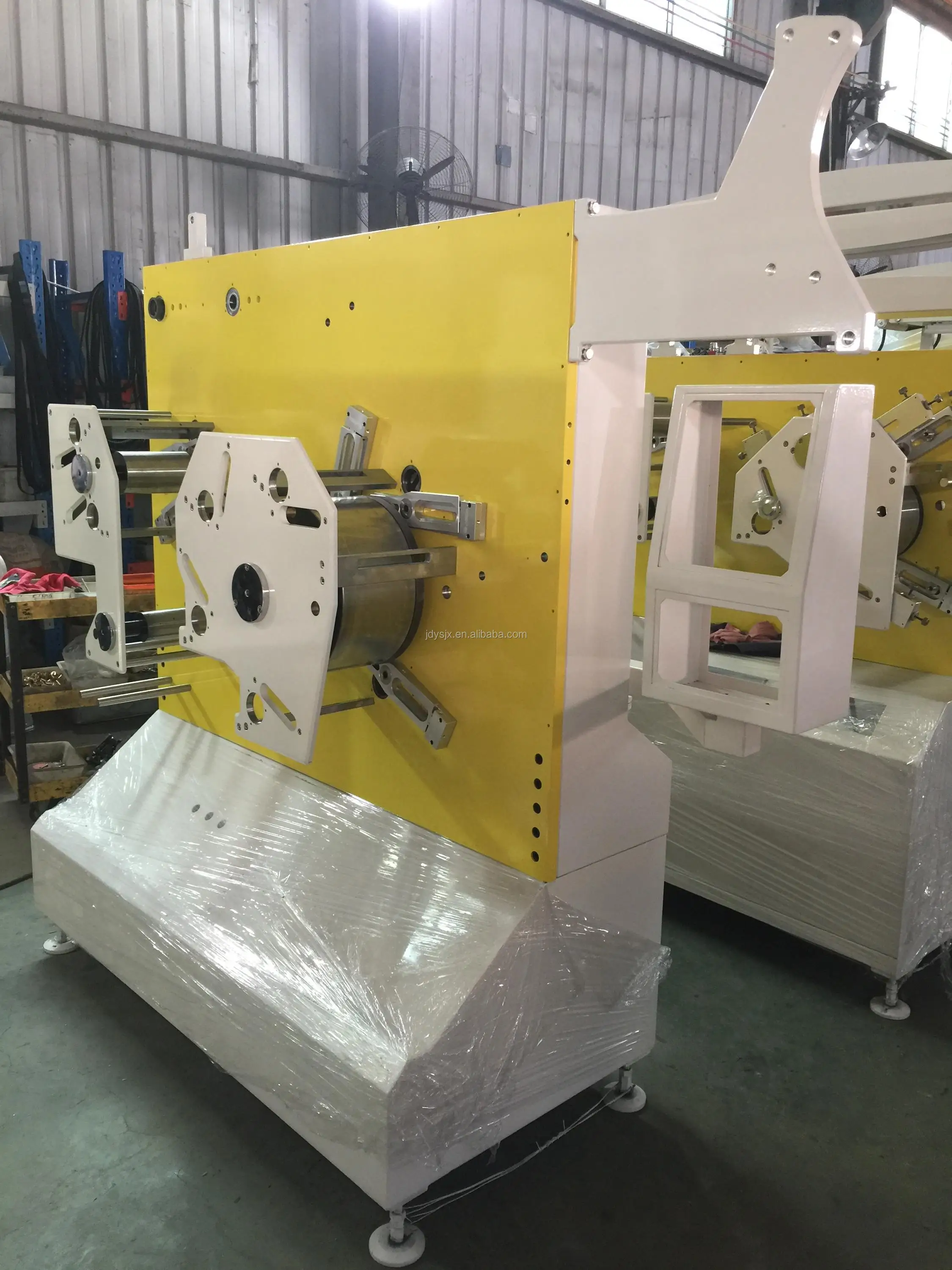 It is a picture of Universal Fabric Label Printing Machine This is a graphic of Universal Fabric Label Printing Machine