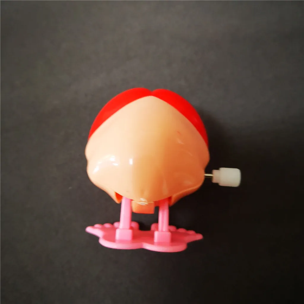 Jumping Wind up chain red lips teeth Dancing toys
