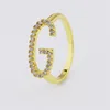 18k gold alphabet G initial letter cz ring