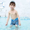 Ad OEM latex kids beachshorts polyester sublimation printed swimming trunks with draw string