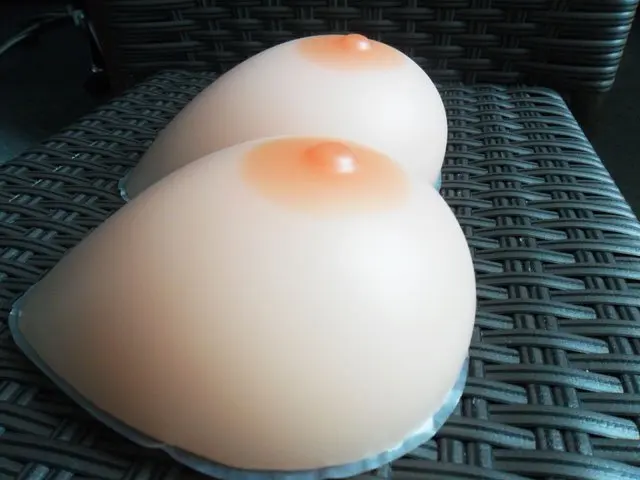 Benz having Silicone breast insert very