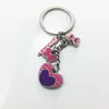 Wholesale custom heart shape logo metal keychain with stoving varnish technology