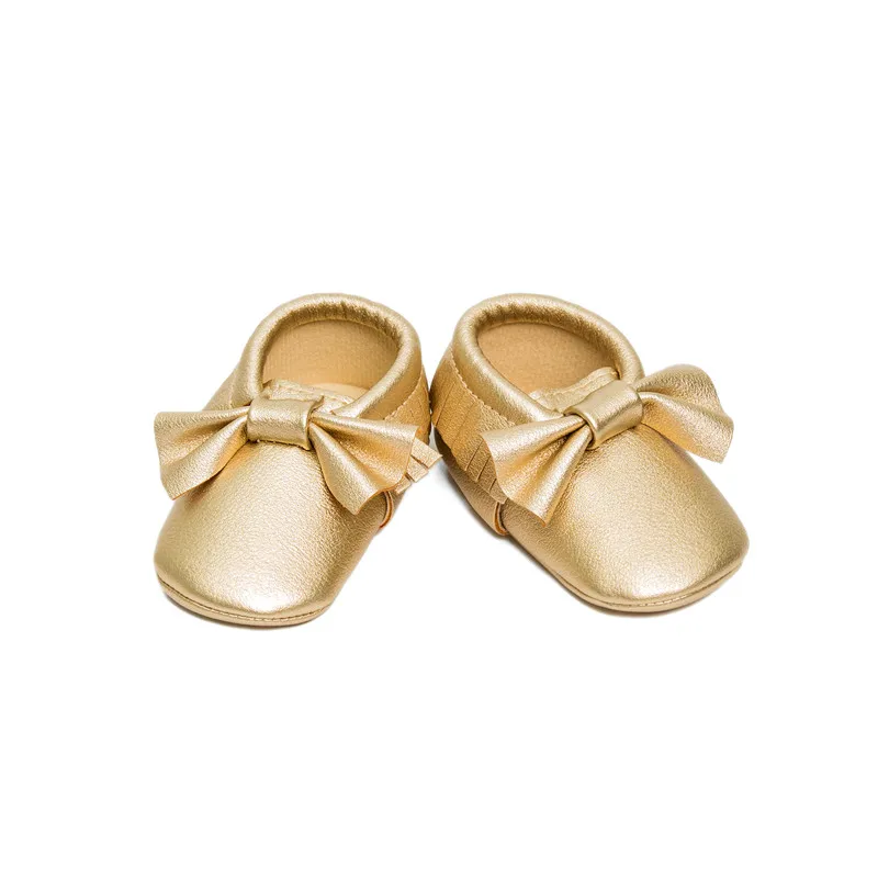 gold baby shoes