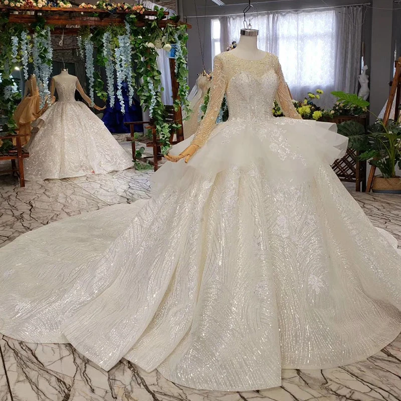 peplum wedding dress with lace sleeves