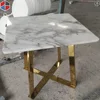 Modern white marble table top with cast iron base