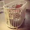 Hot sale multifunctional pine wood round baby crib bed