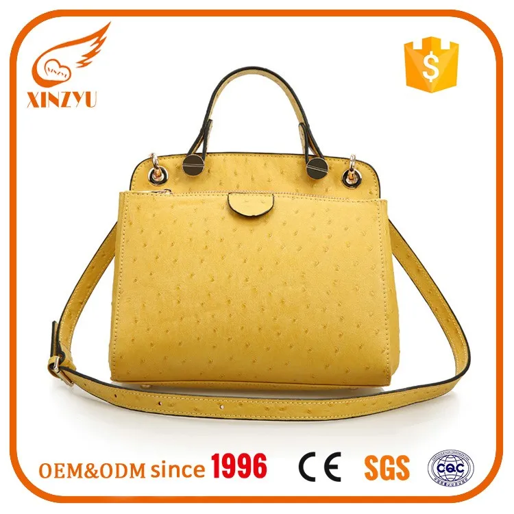 gold coloured handbags