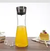 1000ml Shaped Decorative Glass Pitcher Hand Blown Glass Pitcher Cheap Pyrex Glass Pitcher With Stainless Steel Lid