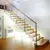 Top level frameless glass railing u-shaped staircase