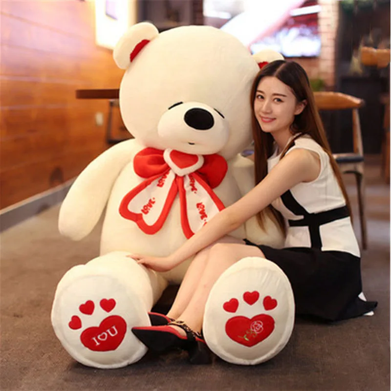 girl in giant teddy bear
