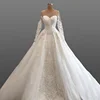 2019 Glamorous Illusion O Neck Long Sleeve Wedding Dresses Lace Buttons Back Bridal Gown With Attachable Overskirt