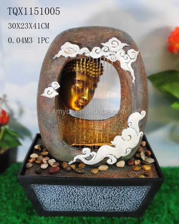 resin meditating buddha on column patio fountain with led light