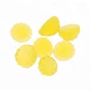 oil coated yellow raspberry shape gummy candy