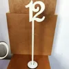 China supplier wholesale Laser cut Display Racks wooden table numbers stand