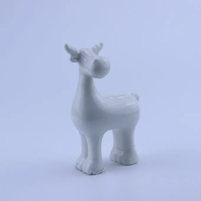 white ceramic reindeer figurine