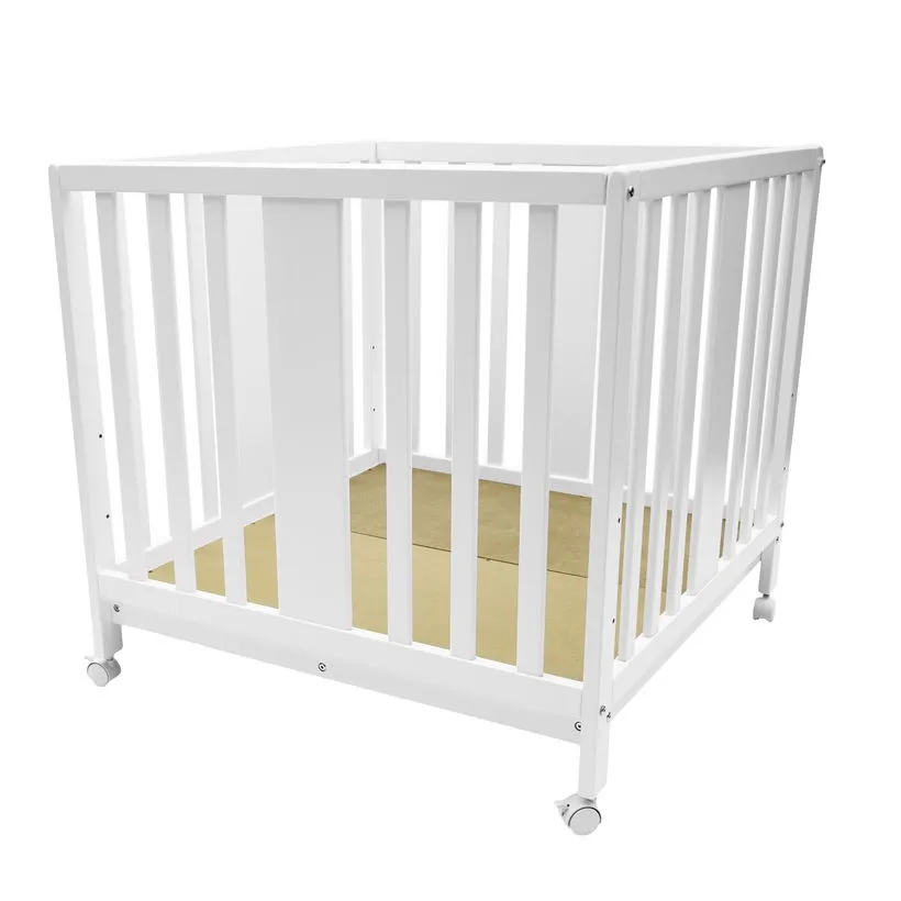 white wooden playpen