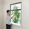 Vertical roller fly screen window with fiberglass net