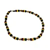 Coconut necklace in rasta color combination with tiger shell nassa