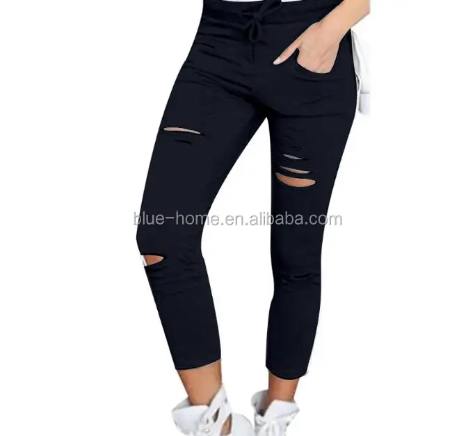 white pants with holes