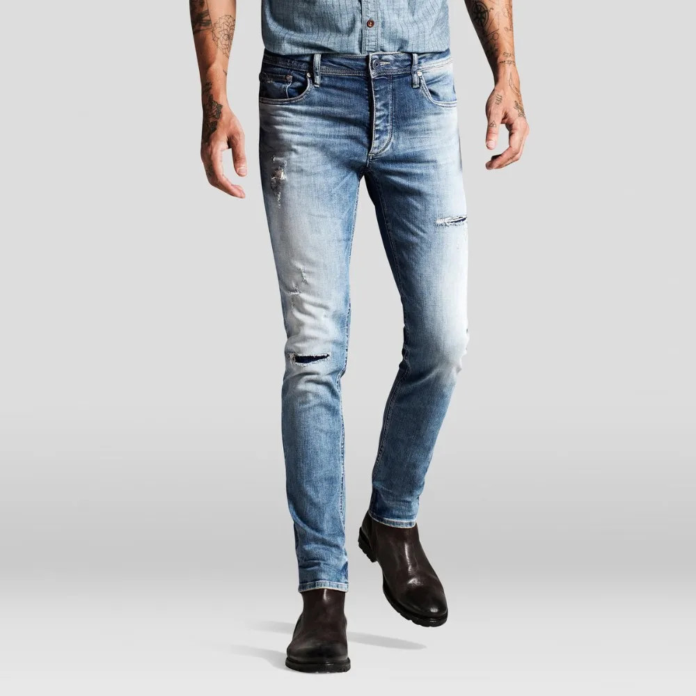 mens jeans with ripped bottoms