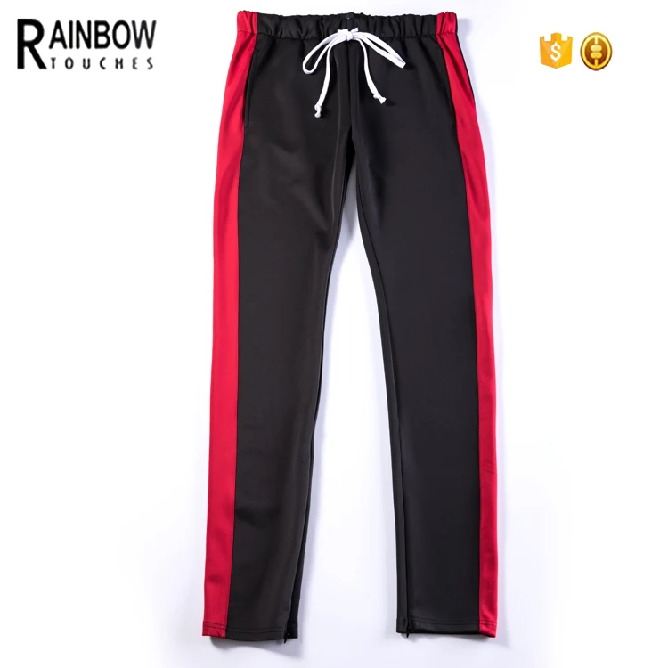 striped track pants with ankled zippers