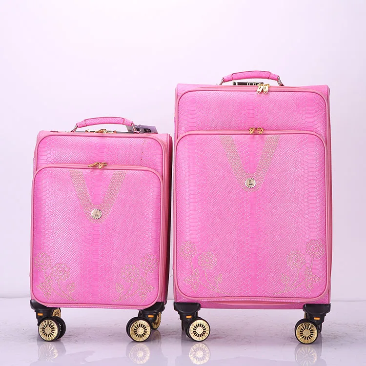 pink lightweight suitcase