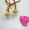 Hot sale free samples 5ml ball shape car perfume air freshener,hanging car perfume bottle