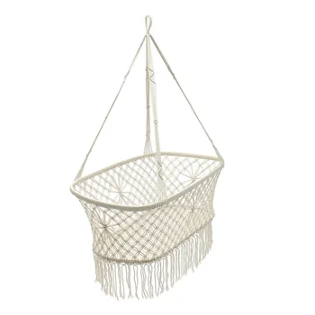 white hanging baby crib