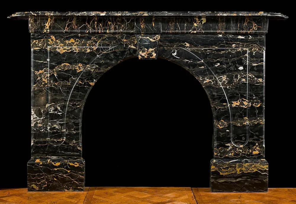 A Victorian Portoro Marble Antique Arched Fireplace Surround Black