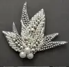 /product-detail/leaf-shape-pearl-appliques-handmade-silver-beaded-bridal-applique-60442595182.html