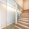 Home used straight stair with wood/glass steps