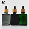 unusual square black frosted glass bottle cosmetic 30ml with bamboo cap and dropper