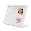 /product-detail/wooden-baby-first-year-photo-frame-for-diy-handprint-and-footprint-with-environmental-protection-clay-60825147848.html