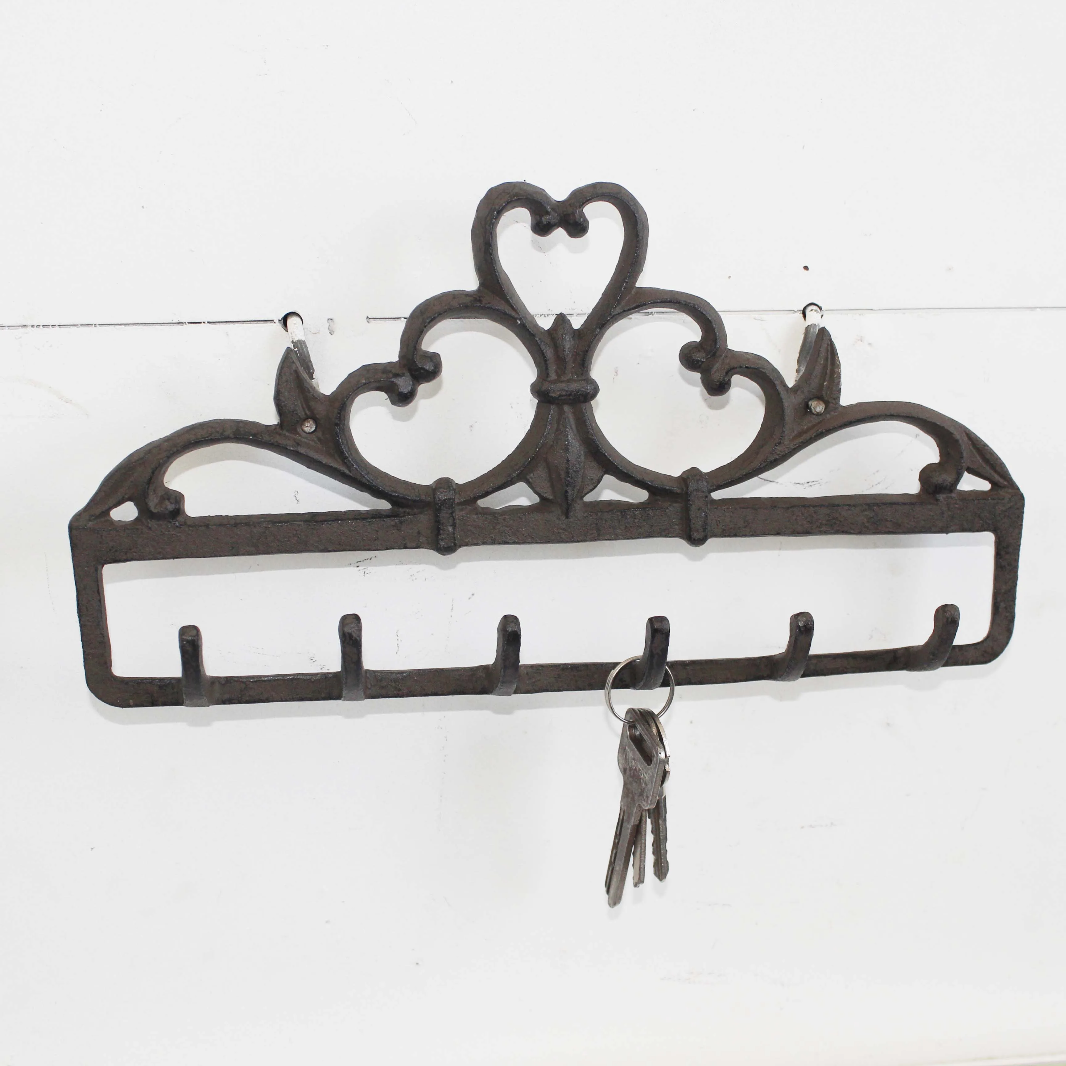 Home decor antique cast iron fleur-de-lis hook.jpg