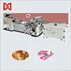 Horizontal double twist candy wrapping machine