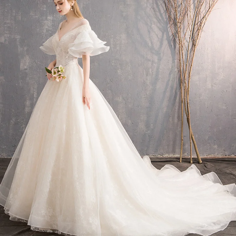 hot sale Sexy Wrap Bra Sleeveless Bride Dress White Strapless Lace Wedding Dress for bride Champagne color