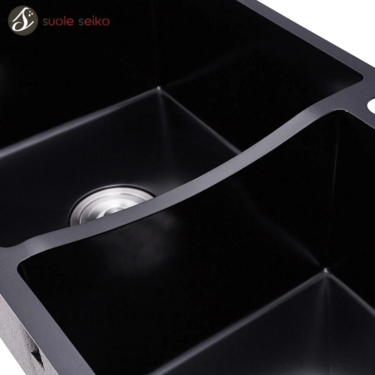 black stainless steel sink with white countertop