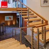 modern stair steel cable railing system design wood tread hidden cantilever stairs