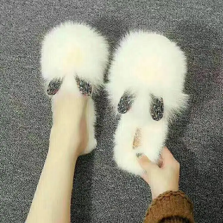 white fox fur slides