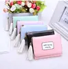 NEW LETTER SHORT STYLE WOMEN PURSE TASSEL SECRET BUTTON ZERO WALLET MULTI-CAPACITY