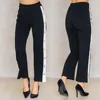 Black woman pants high rise with side stripes with silver snap buttons